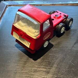 Vintage Tonka Red and Black Toy Vehicle